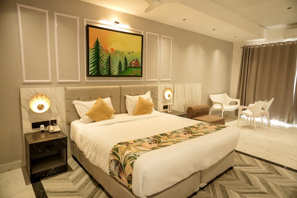 Prime Room with pool and forest views at Citrus Prime Hill Queen Resort, Pachmarhi